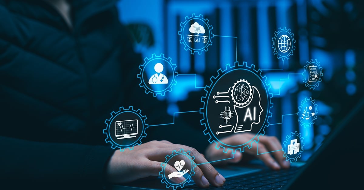 A healthcare professional uses a laptop with digital icons showing AI and connected systems for medication management technology.